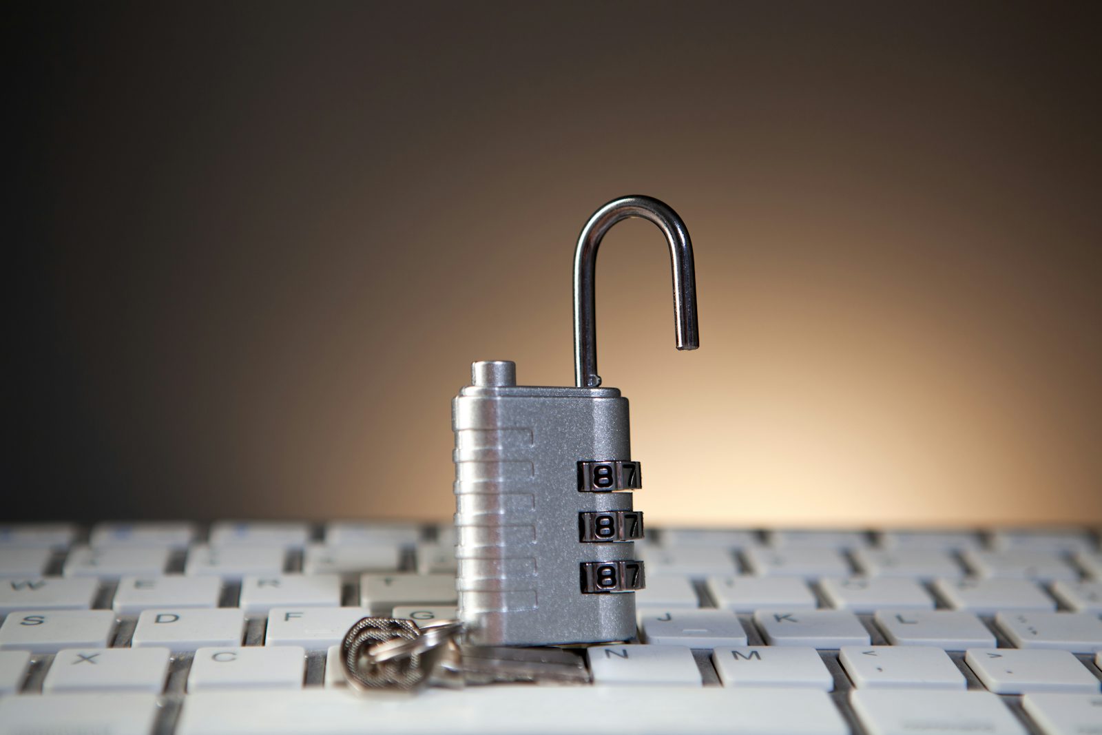 Open padlock on a keyboard symbolizing data privacy