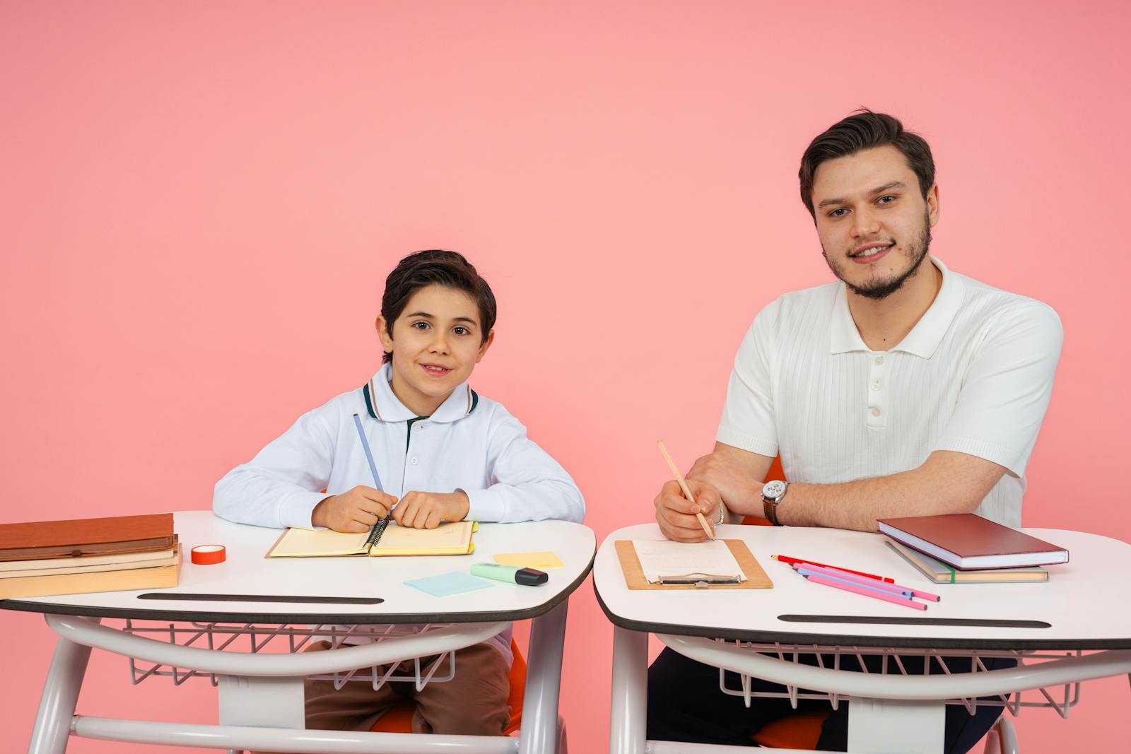 Teacher working with a student in a classroom